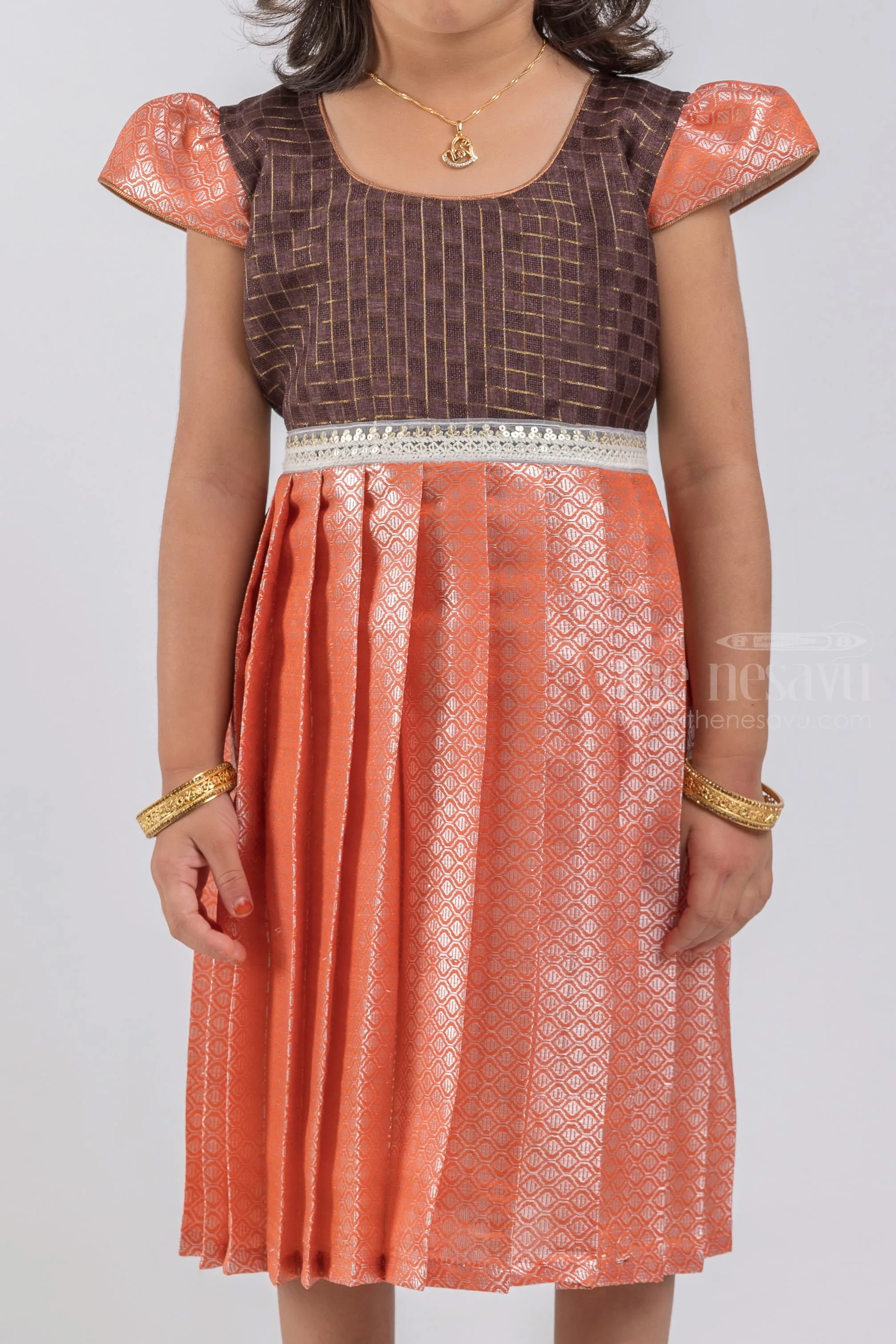 Adorable Checked Pattern Dark Brown Yoke and Knife Pleated Zari With Geometrical Designer Orange Silk Frock for Girls