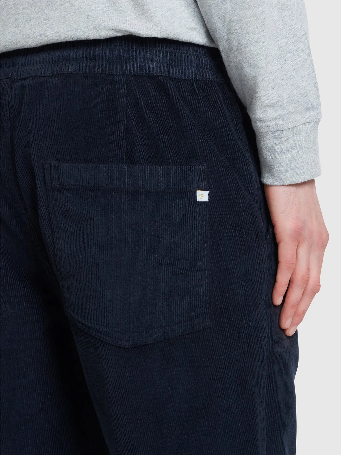 Hawtin Relaxed Tapered Fit Cord Trousers In True Navy